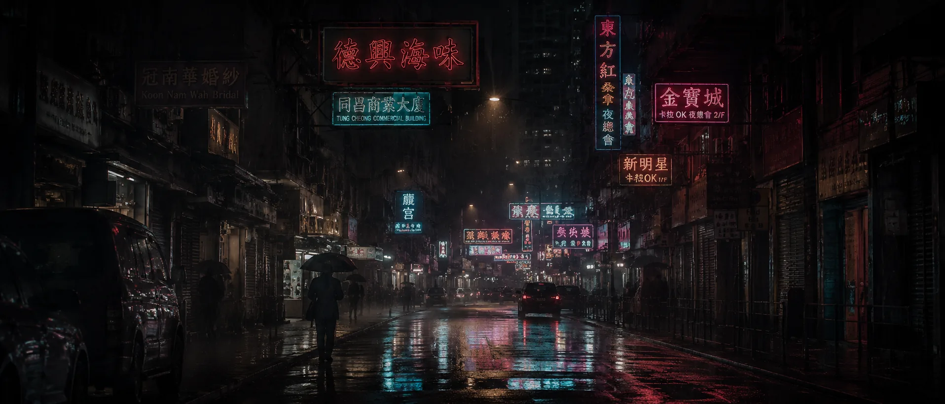 A canyon of neon shop signs after rain, the wet road doubling every light, a figure under an umbrella small in the frame